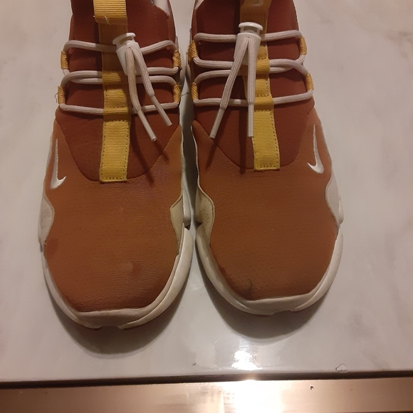 A pair of Nike sneakers. - Picture 3 of 4